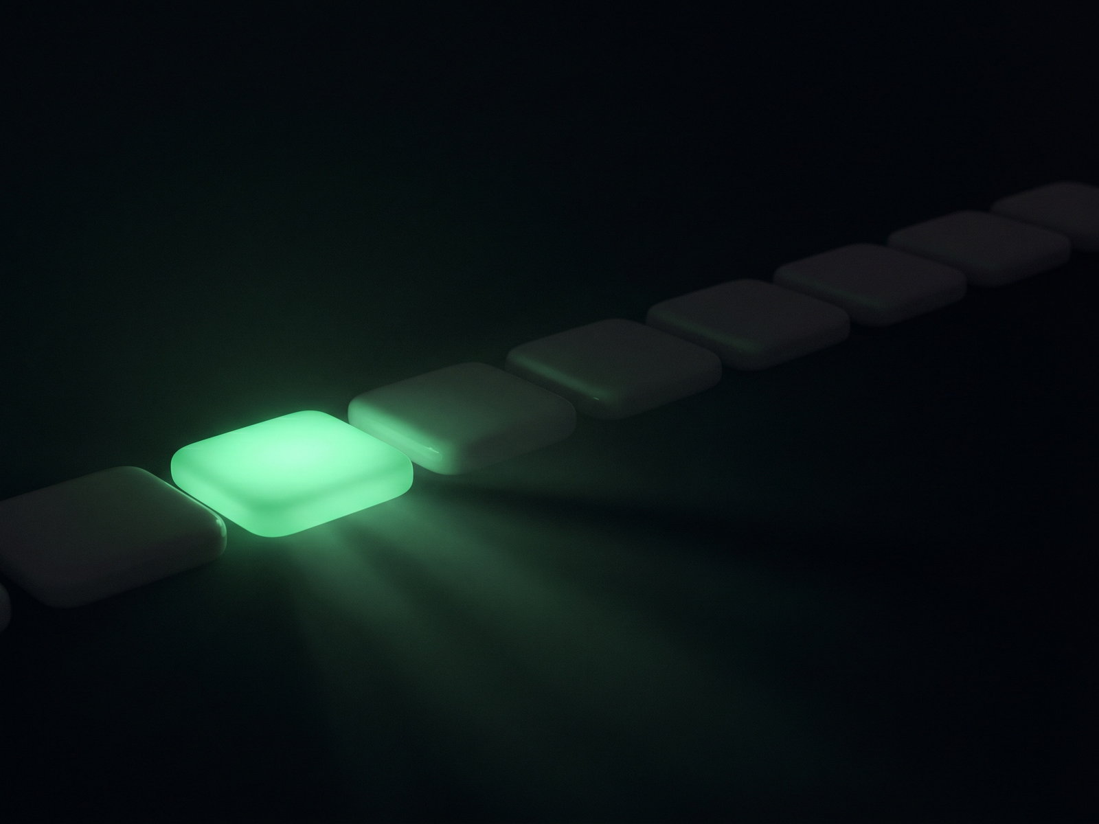 A row of tiles with the next one glowing emerald